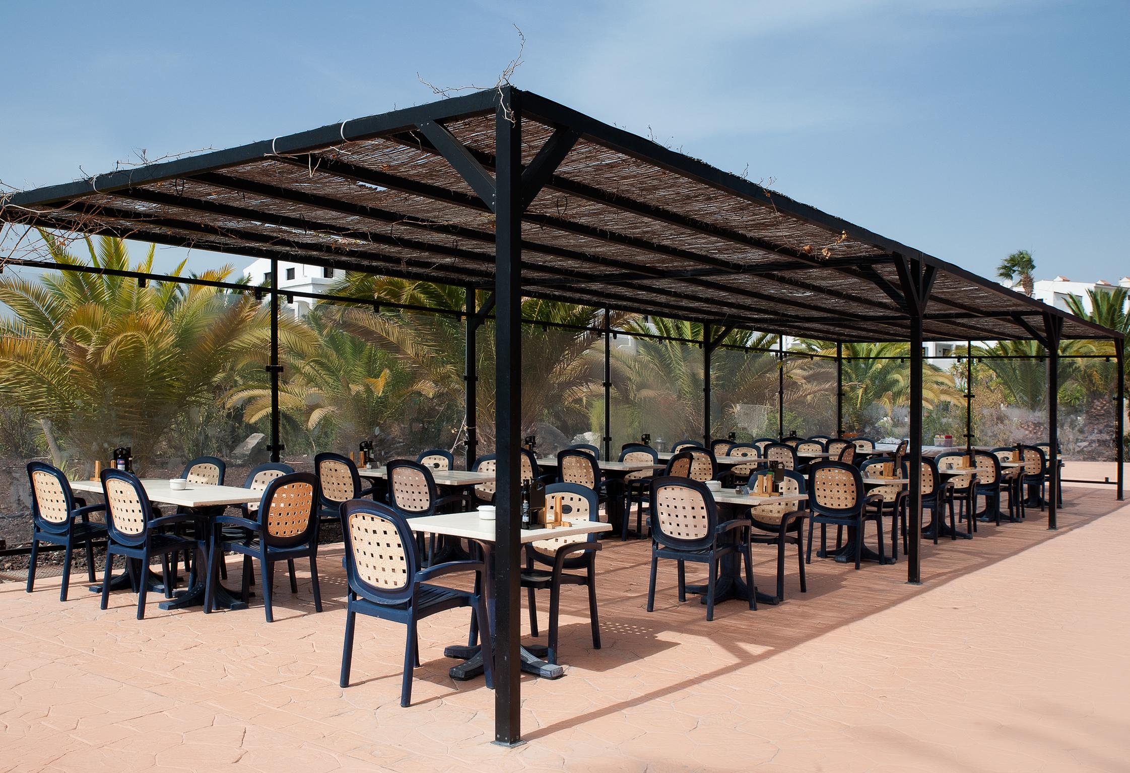 Grand Muthu Golf Plaza Hotel & Spa San Miguel de Abona Exterior photo The dining room at the Al-Maqam Al-Sadiq