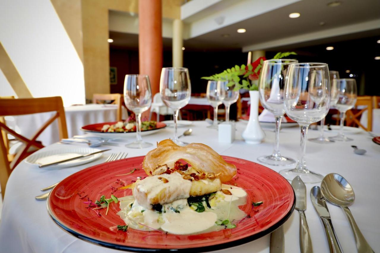 Grand Muthu Golf Plaza Hotel & Spa San Miguel de Abona Exterior photo A restaurant in the resort